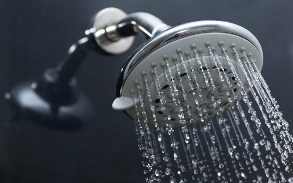 THE SIMPLE THINGS: Reducing the time spent in the shower is an easy way to regulate water use. FILE PHOTO