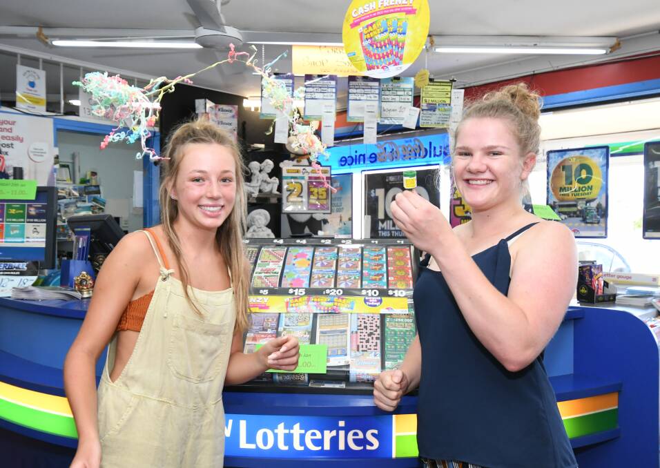 CELEBRATING: Greengate Newsagency's Xanthe Keegan and Liz Bowmer marking the sale of a winning lotto ticket at the shop. Photo: JUDE KEOGH