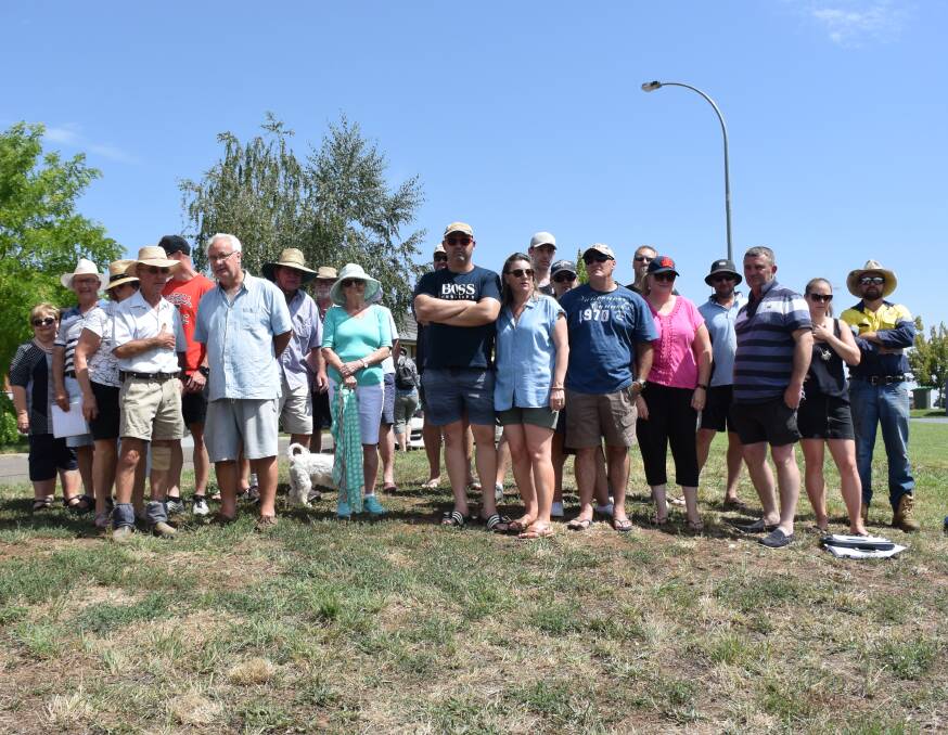 WORRIED: Residents met near the domestic violence crisis 
centre site off George Weily Place to voice their concerns 
on Sunday. Photo: DAVID FITZSIMONS 