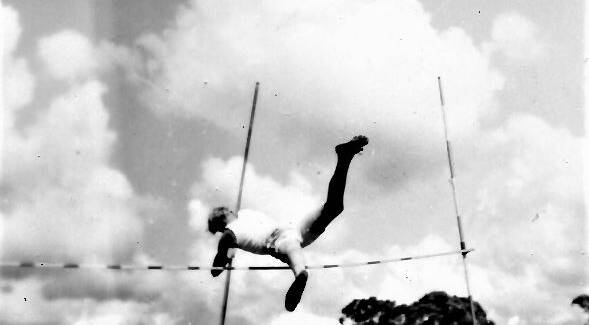 UP HE GOES: Current president of the Old Fairbridgians’ Association Derek Moriarty competing in the pole vault during a Fairbridge Farm Olympics event. Photo: SUPPLIED