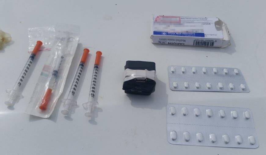 PART OF THE HAUL: The homemade taser, tablets and syringes. Photo: CORRECTIVE SERVICES NSW