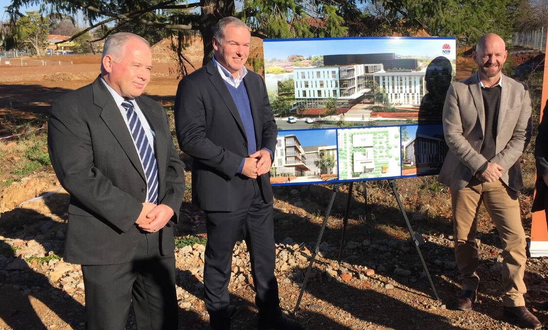 ALL SMILES: Orange City councillor Jeff Whitton, DPI NSW director general Scott Hansen, and Primary Industries Minister Niall Blair announcing the DPI's new home at the former Orange Base Hospital site in Prince Street.
