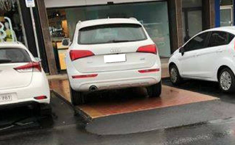 THE REAR VIEW: Another shot of the parking effort which led to a torrent of criticism for the driver. Photo: FACEBOOK