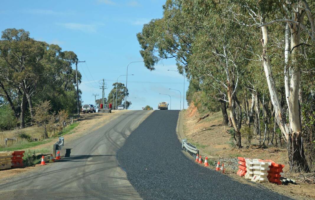 TIME FOR A BREAK: Roadworks being undertaken on Burrendong Way in February this year. Aside from a couple of ongoing projects, Orange City Council's crews and contractors have completed their road-building program for the 2017-18 financial year. Photo: FACEBOOK/ORANGE CITY COUNCIL