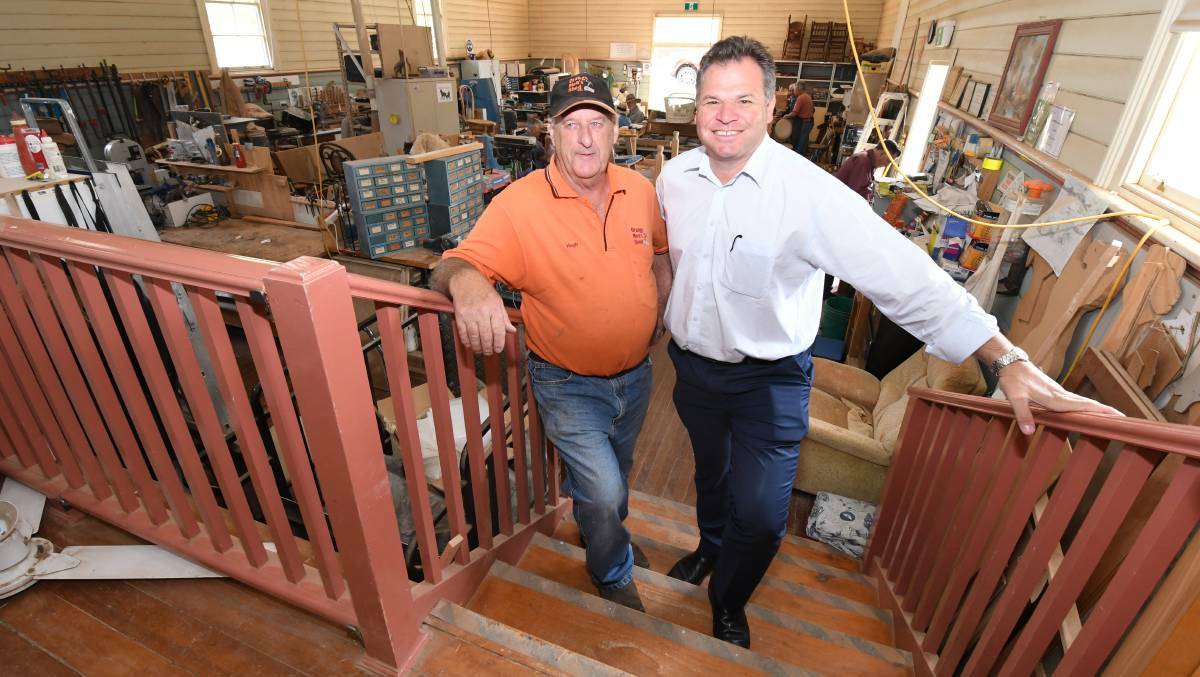 SHED UPGRADE: Orange Men's Shed president Hugh Laird with member for Orange Phil Donato after the successful application for a grant to create a quiet space. Photo: JUDE KEOGH