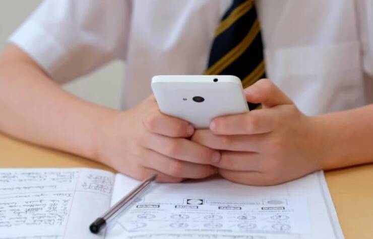 COMMON SIGHT: Victoria has banned all students from using mobile phones in schools from 2020. FILE PHOTO