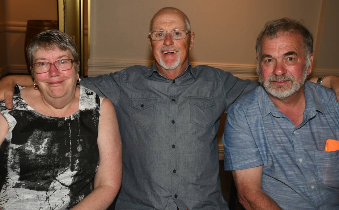 CAR SHOW DINNER: Maureen Johnstone, Phillip Harkinson and Norm Johnstone at Orange Ex-Services' Club on Saturday night. Photo: CARLA FREEDMAN