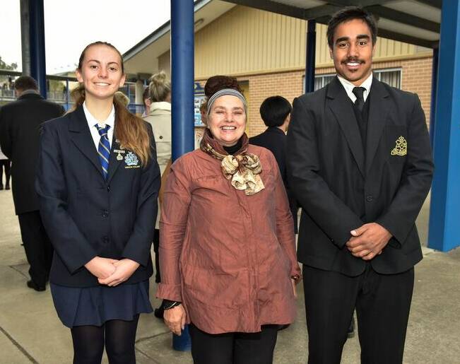 RESPONSIBILITIES: Orange High School's Elijah Smyth (right) with Denison College Bathurst High Campus student Niamh McAdamand Executive Director Aboriginal Education and Community Engagement Michele Hall. Photo: CONTRIBUTED