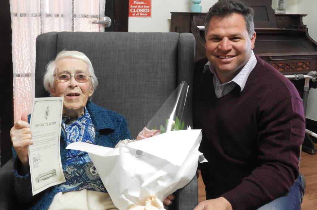 MANY HAPPY RETURNS: Member for Orange Phil Donato with Moyne Aged Care Plus resident Ms Cecille Farley on her 100th birthday. Photo: SUPPLIED