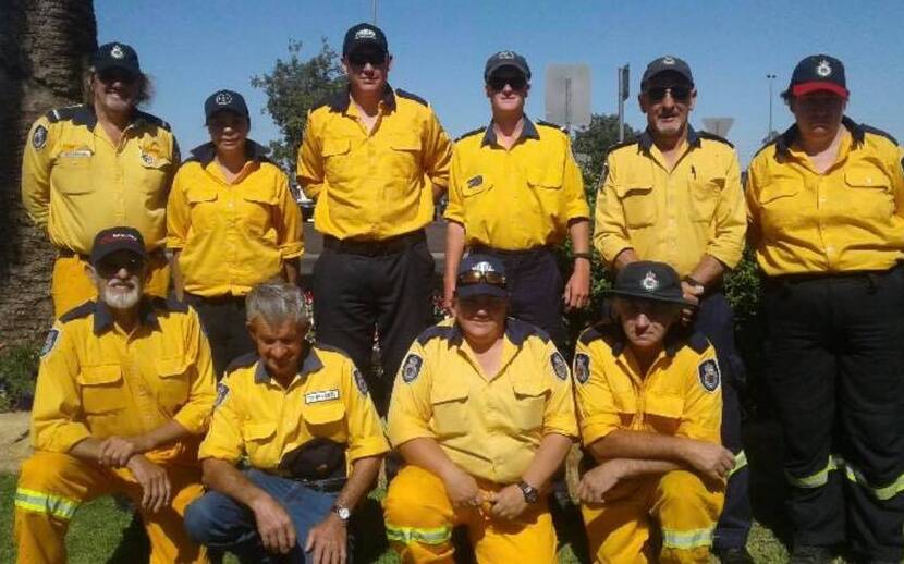 HELPING OUT: NSW Rural Fire Service Canobolas Zone firefighters Geoff Olde, Kristy Crossman, Adam Williams, Spencer Hawkins, Steve Vardanega and Cheryl Kinghorne with (front) Bruce Ringwood, Ted Milsteed, Karina Russel and Denis Hibberd are in Queensland fighting the bushfire. Photo: NSW RFS