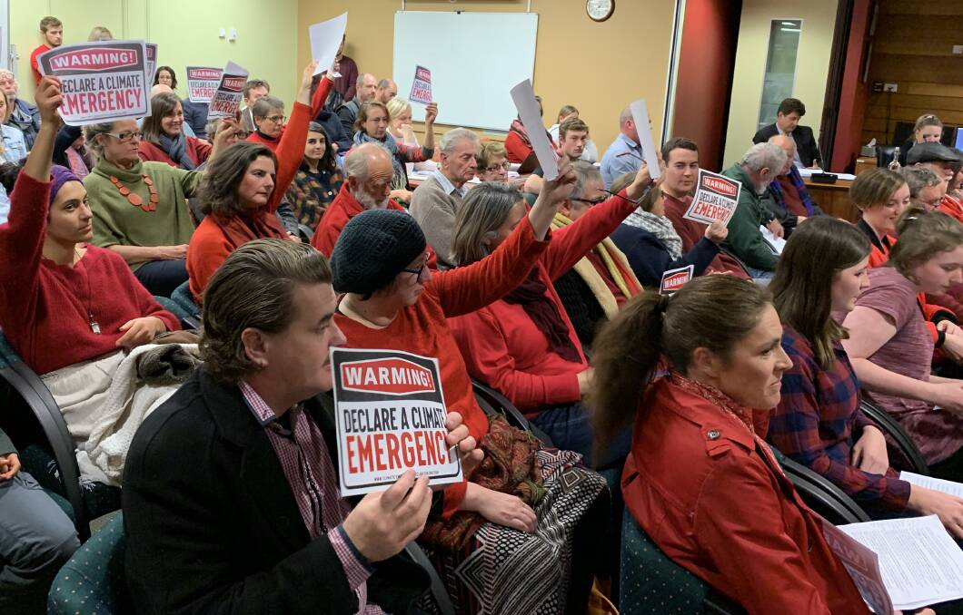 MAKING THEIR POINT: A group lobbying for Orange City Council to declare a climate change emergency at Tuesday night's meeting.