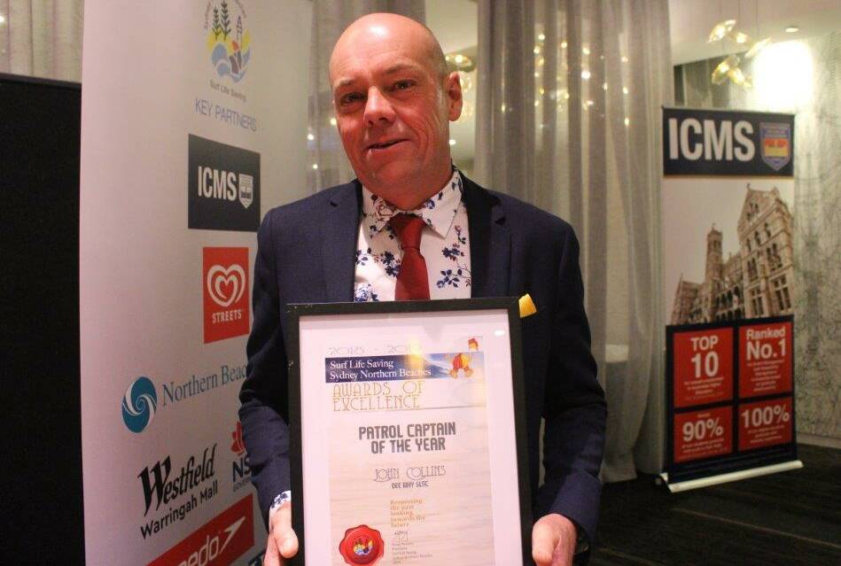 PROUD MOMENT: John Collins with his award on the night it was presented to him. Photo: FACEBOOK