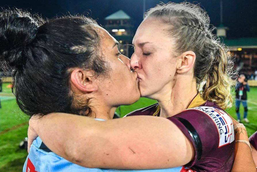 EMBRACE: Vanessa Foliaki (left) and Karina Brown kiss at the end of the inaugural women's State of Origin match on Friday. Photo: NRL/FACEBOOK