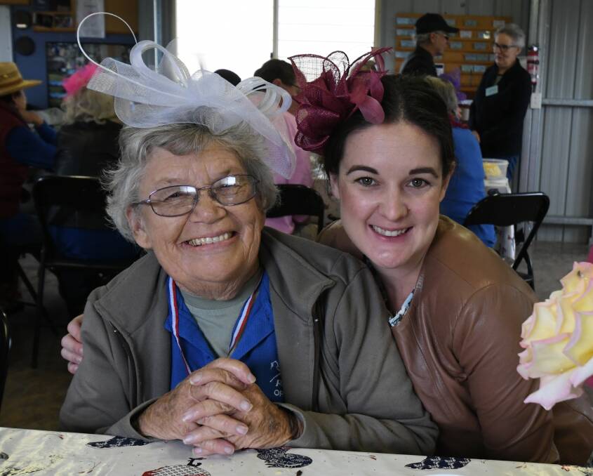 SWAN SONG: Barbara and Renee Edge at this year's Riding for the Disabled Melbourne Cup day. Photo: JUDE KEOGH