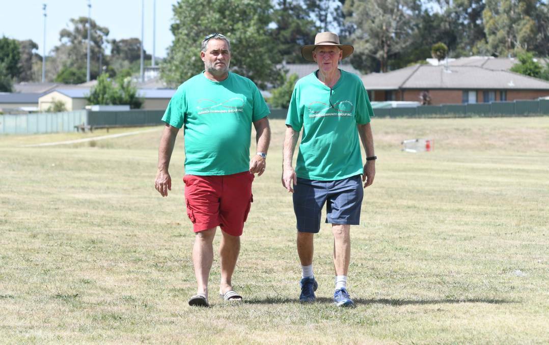 PLAN COMING TOGETHER: Glenroi Community Group members Joe Maric and Graeme Davidson at Glenroi Oval in January. Photo: JUDE KEOGH 0112jkglenroi2