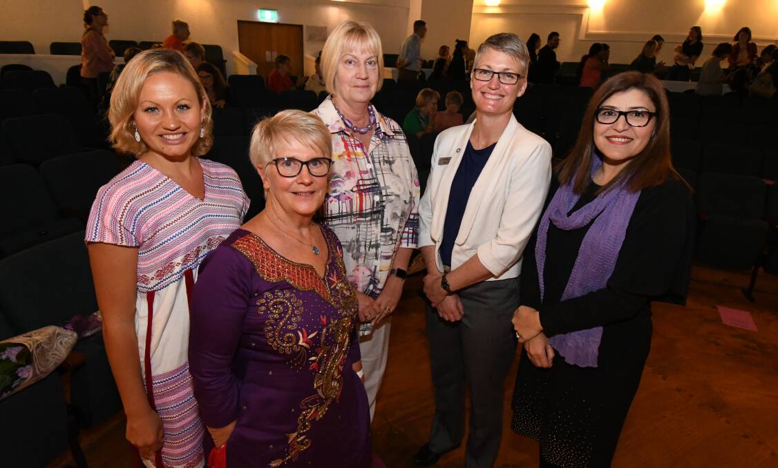 IN IT TOGETHER: KJ Riles, Mary Brell OAM, Lois Willing, Joanne McRae and Bushra Aman at Friday's International Women's Day lunch. Photo: JUDE KEOGH 0308jkwomen2
