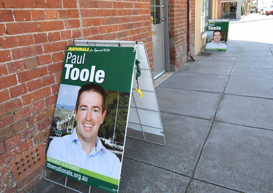 NOW YOU SEE IT: The Nationals brand rates a small mention on the signs placed on the footpath outside the campaign office.