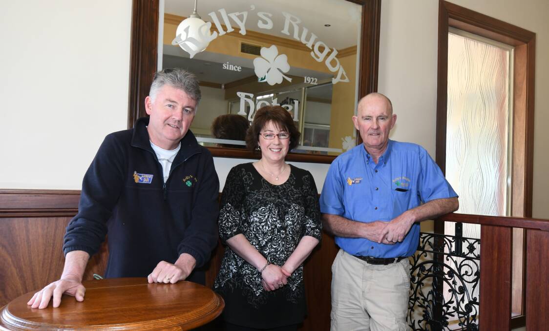 THEY'LL BE MISSED: Siblings Mark Kelly, Melissa Englert and Bill Kelly at their soon-to-close Kelly's Hotel in Lords Place. Photo: CARLA FREEDMAN 1022cfkellys3