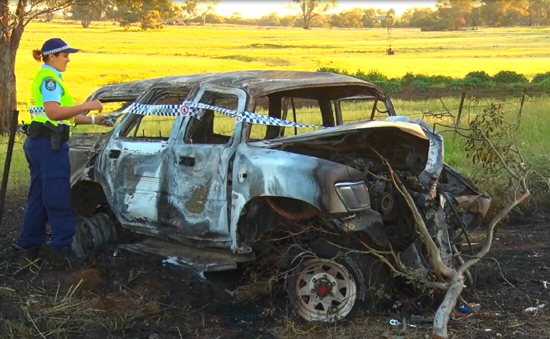 IN THE NICK OF TIME: A heroic motorist saved a father and son from this burning car near Yeoval on Saturday. Photo: TOP NOTCH VIDEO
