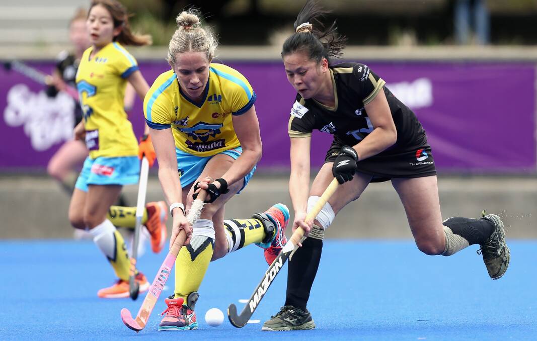 SO CLOSE: Canberra Chill skipper Edwina Bone battles for possession in her side's gutting, shoot-out, semi-final loss to Melbourne last weekend. Photo: HOCKEY AUSTRALIA