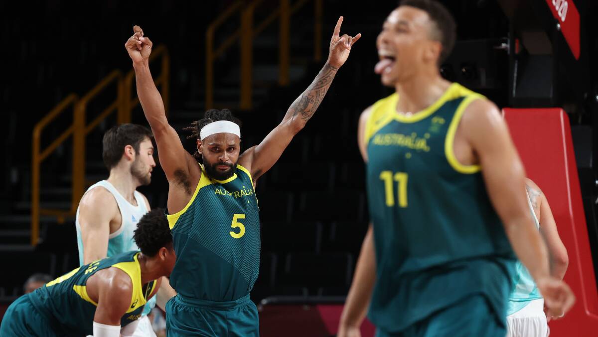 An emotional Patty Mills led Australia to a breakthrough bronze medal at the Tokyo Olympic Games. Picture: Getty