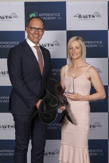 Thanks: Corey Wingard presents Sophie Logan with her award. Photo: Supplied.
