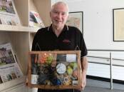 Tim Williams with his hamper he won on Wednesday afternoon. Picture is by Carla Freedman