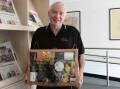 Tim Williams with his hamper he won on Wednesday afternoon. Picture is by Carla Freedman