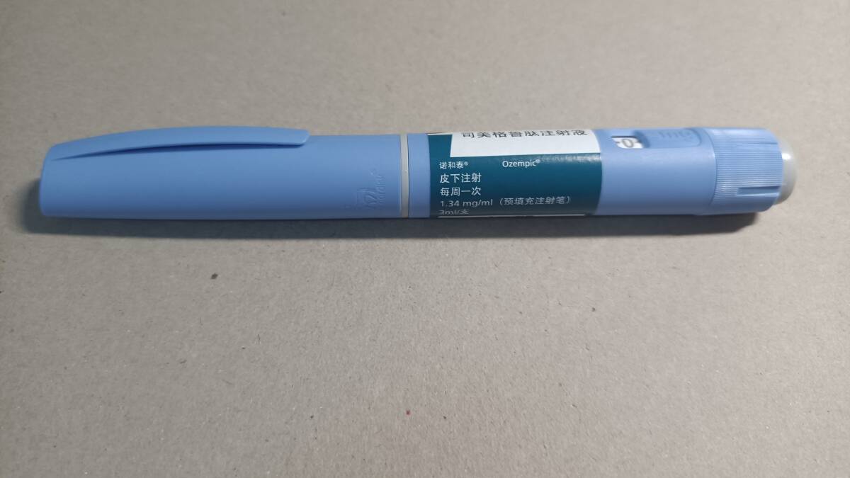 A blue Ozempic pen against a white background. Picture is from Shutterstock. 