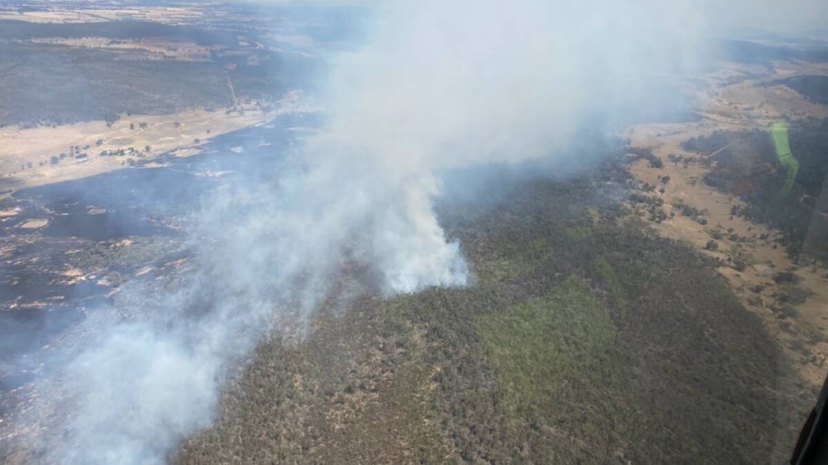 Smoke from the Staircase Road fire near Parkes on Sunday. Picture supplied by the Rural Fire Service