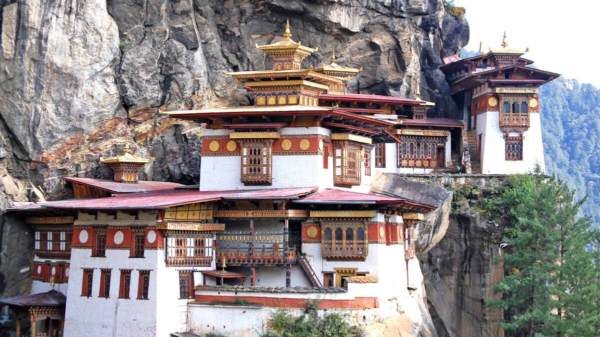 Taktsang Lhakhang … a monastery perched on the side of a cliff 900 metres above the valley floor. 