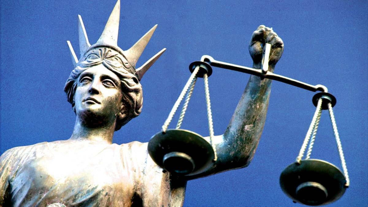 A Lady Justice statue with a set of scales in hand. File picture