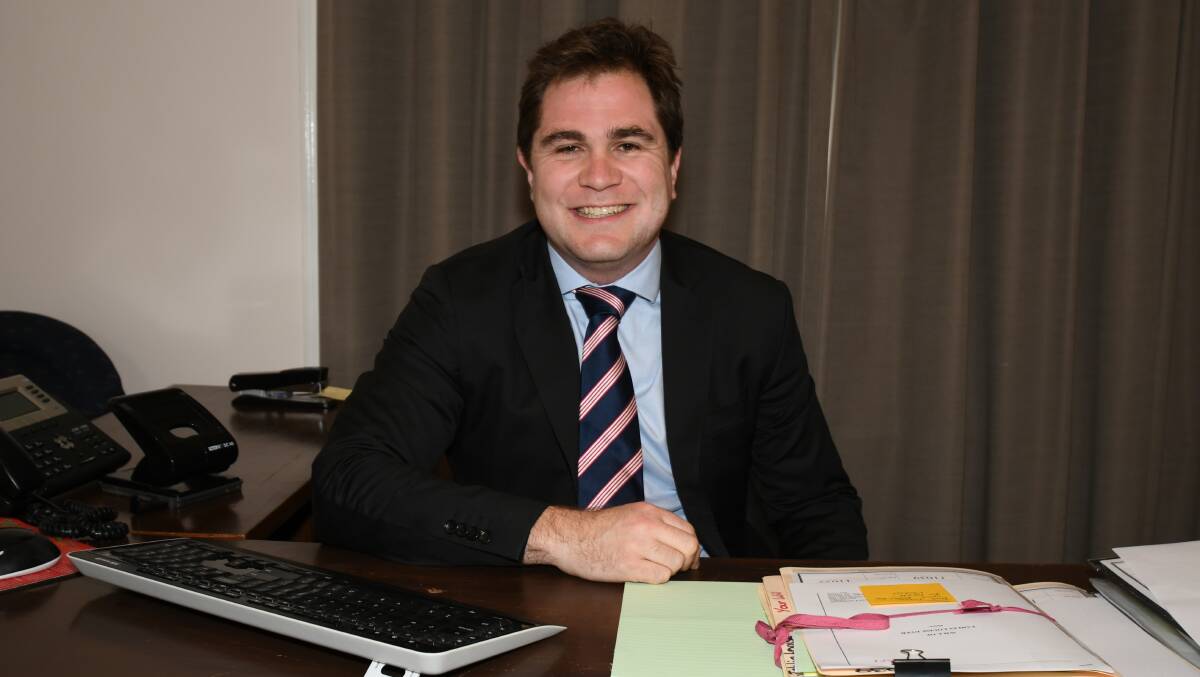 FAMILY BUSINESS: Tom Messenger has taken over Messenger and Messenger Solicitors from his parents. Photo: CARLA FREEDMAN