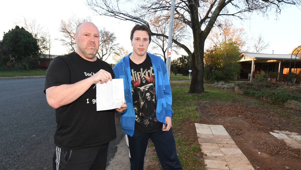 NOT HAPPY: Shane and Jeremy Reed were surprised parking on their nature strip was illegal. Photo: JUDE KEOGH