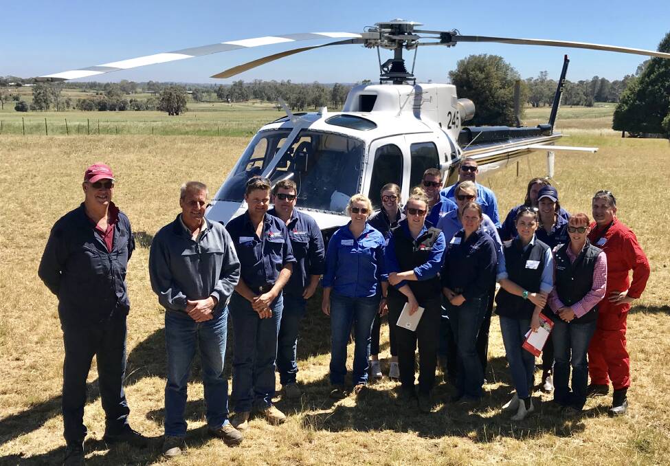 SUCCESSFUL DAY: Orange Helicopters pilot and operator Dean Brus, Laurie Mullen, Perry Newman, Dan Walsh, Erica Kennedy, Chelsea Maddern, Kate Comb, Luke Booth, Kirstin Bisley, Lucy Downs, Tim Daly, Julie Reynolds, Matt Cottrell, Georgia Grimmond, Kyra O'Brien and IPAS aviation instructor Conway Bown. 