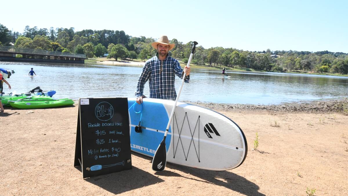 PADDLIN' AWAY: Float Stand Up Paddle owner Simeon Cooke will be at the lake on weekends and public holidays. Photo: CARLA FREEDMAN