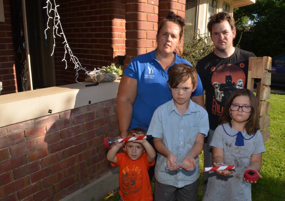 DEVASTATED: Arlo, Jodie, Gus, Jamie and Lucy Stewart had their Christmas lights torn down and stolen. Photo: DANIELLE CETINSKI 1218dclights2