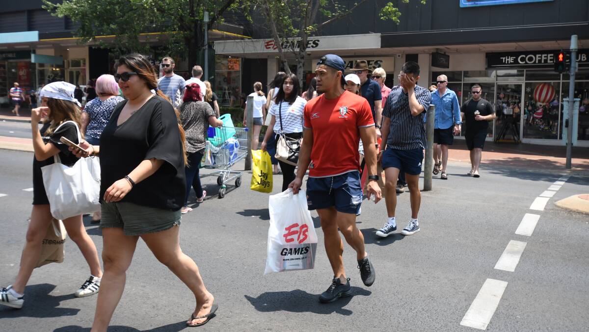 ON A MISSION: Plenty of shoppers were in the CBD on Thursday for the Boxing Day sales. Photo: JUDE KEOGH