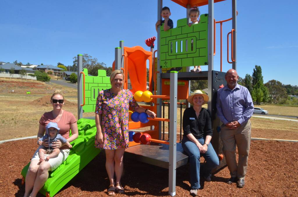 OPEN SPACE: Charlie and Lauren Venner, Sarah and Angus Wright, Lillian Venner and councillors Joanne McRae and Jason Hamling at the Wentworth Estate playground.