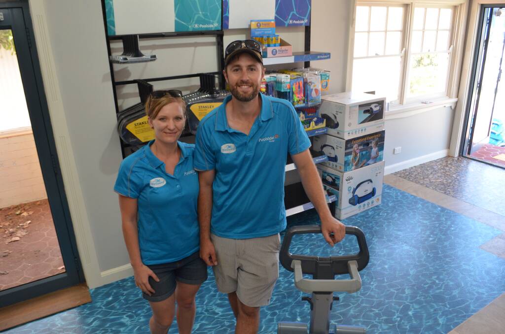 WATER WORKS: Poolside Orange's Tegan and Nick Cunial in their freshly fitted out store.