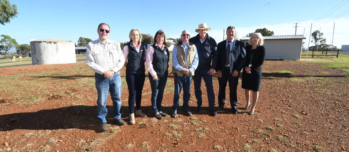 CASH ADVANCED: Orange Field Days Co-op committee members Dan Toohey, Bree McMinn, Jayne West and Sam Connell with member for Calare Andrew Gee, Cabonne mayor Kevin Beatty and Cabonne Council acting general manager Heather Nicholls. Photo: JUDE KEOGH 0326jkfield1