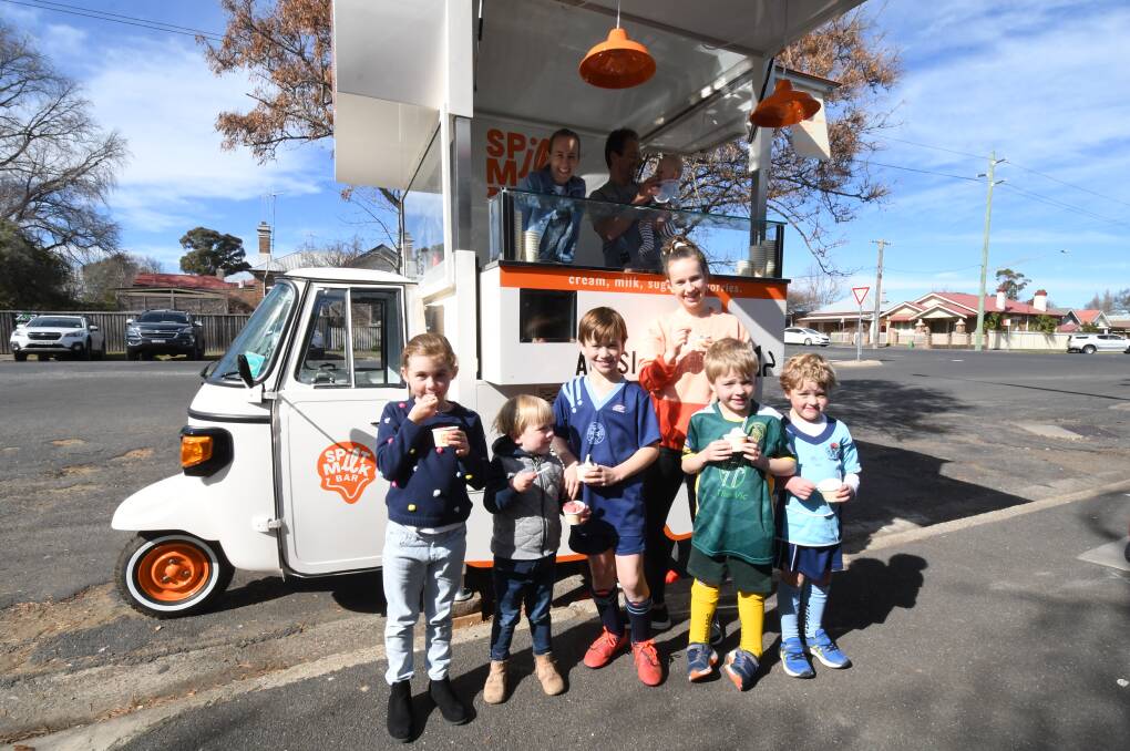 GELATO TIME: Sarah Quigley and Jeremy Norris served up gelato to Maggie Norris, Georgia Maurice, Monty Norris, Henry and Matilda Quigley and Freddie and Archer Mendland on the weekend. Photo: JUDE KEOGH