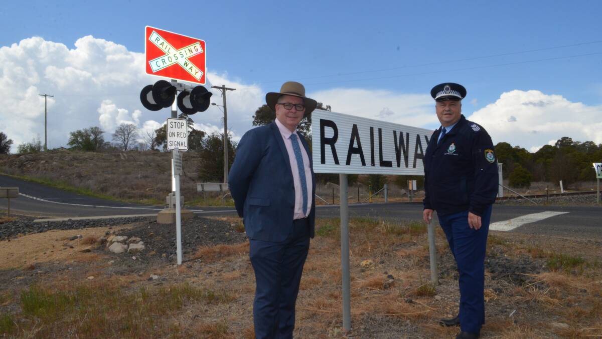 SLOW DOWN: Transport for NSW western region director Alistair Lunn, Traffic and Highway Patrol Command Senior Sergeant Mick Timms.