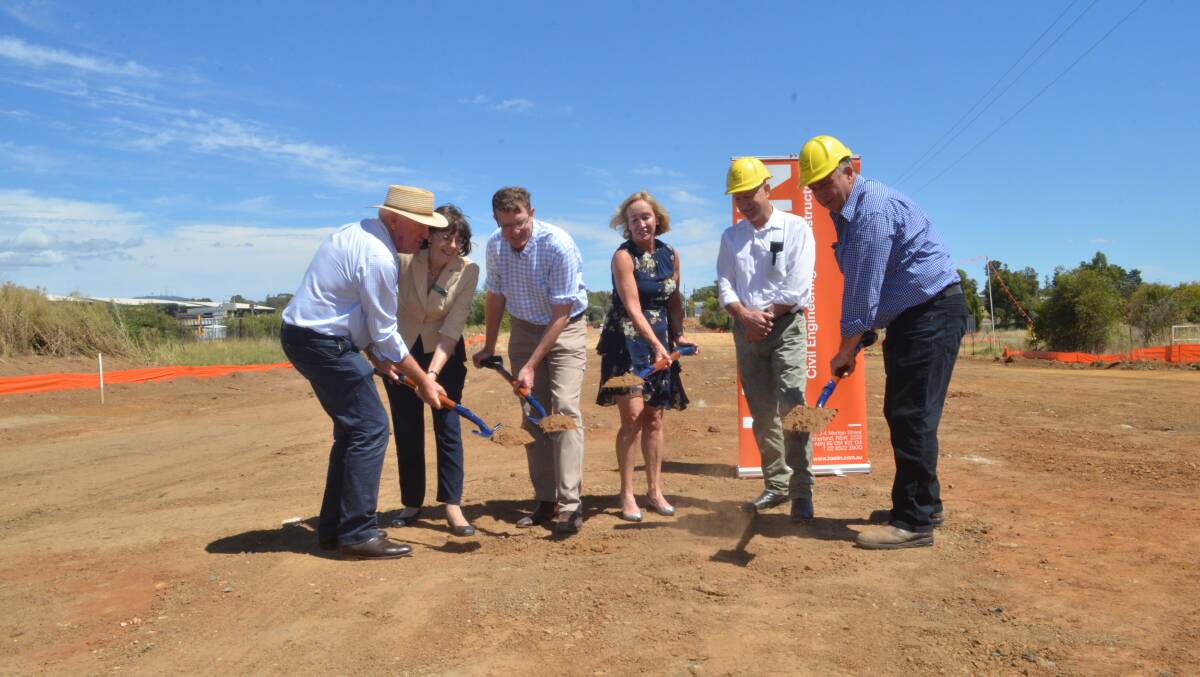 TURNING THE SOD: Western NSW parlimentary secretary Rick Colless, Nationals candidate for Orange Kate Hazelton, member for Calare Andrew Gee, Haslin Constructions general manager Gladys Woods, councillor Scott Munro and deputy mayor Sam Romano on Friday. 