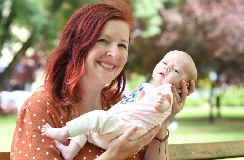 TINY ADDITION: Guin Missingham, pictured with eight-week-old daughter Ettie, says it's fulfilling to help others find joy in family. Photo: JUDE KEOGH 1101jkeggs1
