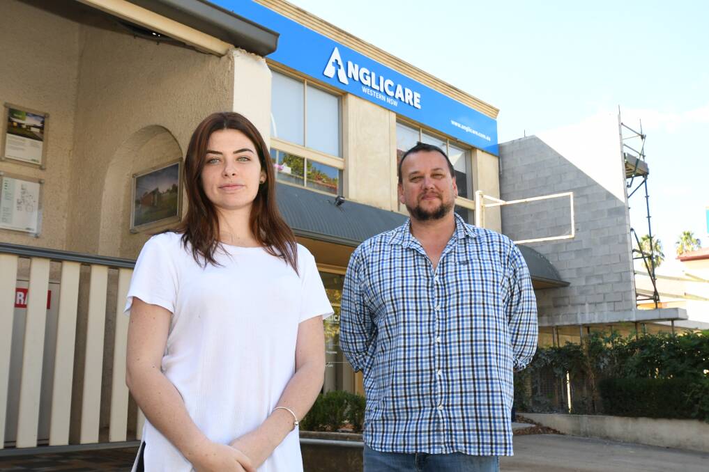 TOUGH TIMES: Rachael Carr and Anglicare out of home care case manager Barry Porter. Photo: JUDE KEOGH 0427jkhousing1