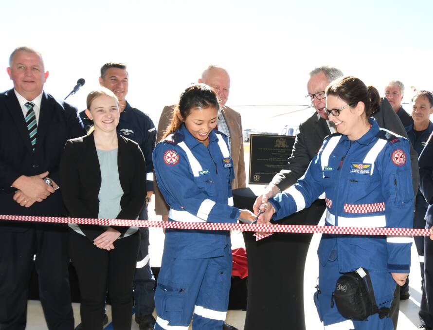RISING ABOVE: Nationals candidate for Orange Yvette Quinn (second from left) at Monday's helicopter base opening. Photo: JUDE KEOGH