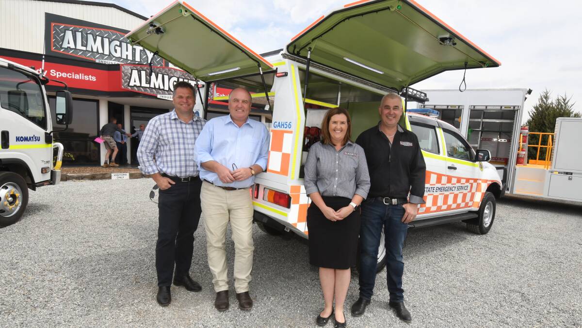 READY TO ROLL: Member for Orange Phil Donato, Minister for Emergency Services David Elliott and Almighty Industries' Jenny and Todd Raffen. Photo: JUDE KEOGH