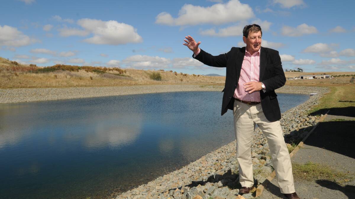 SYSTEM WORKING: Mayor Reg Kidd at the stormwater holding pond. 