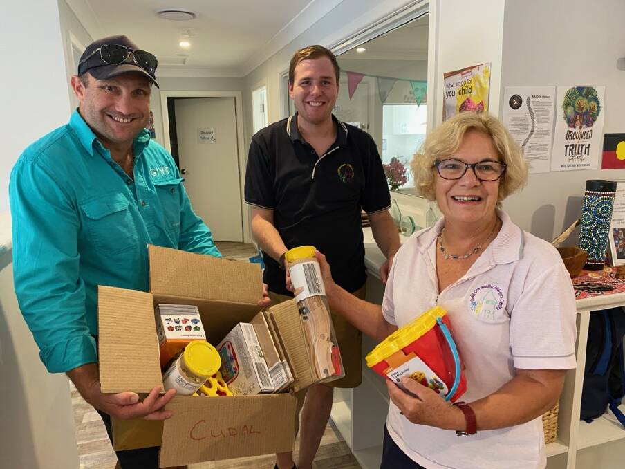 LENDING A HAND: GIVIT NSW manager Scott Barrett with Cudal Children's Centre's Hayden Watts and Robyn Wheatley. Photo: SUPPLIED